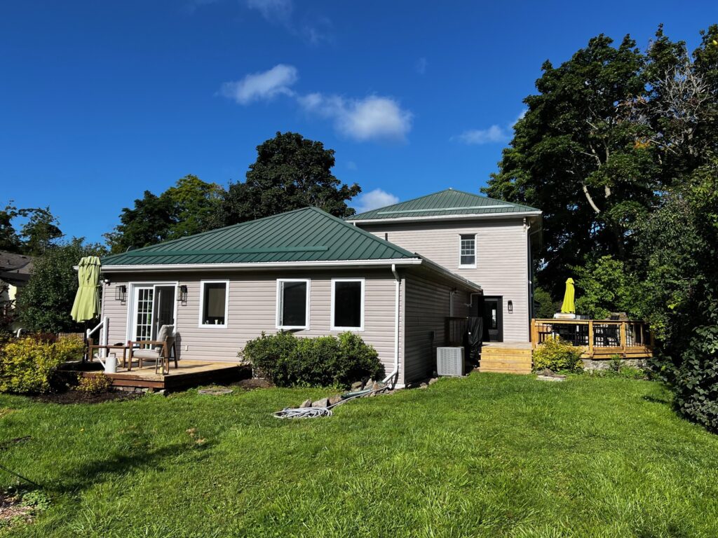 Photo of a house and backyard in summer