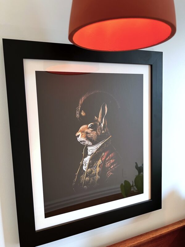 A wall-hung portrait of a regal squirrel in dress military regalia in the entrance hall to SquirrelHaus PEC
